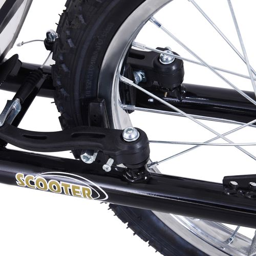 Black stunt scooter rear wheel and brake area with non-slip foot deck