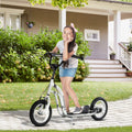 White kids kick scooter with black handlebar brakes, black seat, and 12-inch wheels