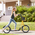 Kids ride-on scooter with orange frame, black handlebars, front basket and mudguard