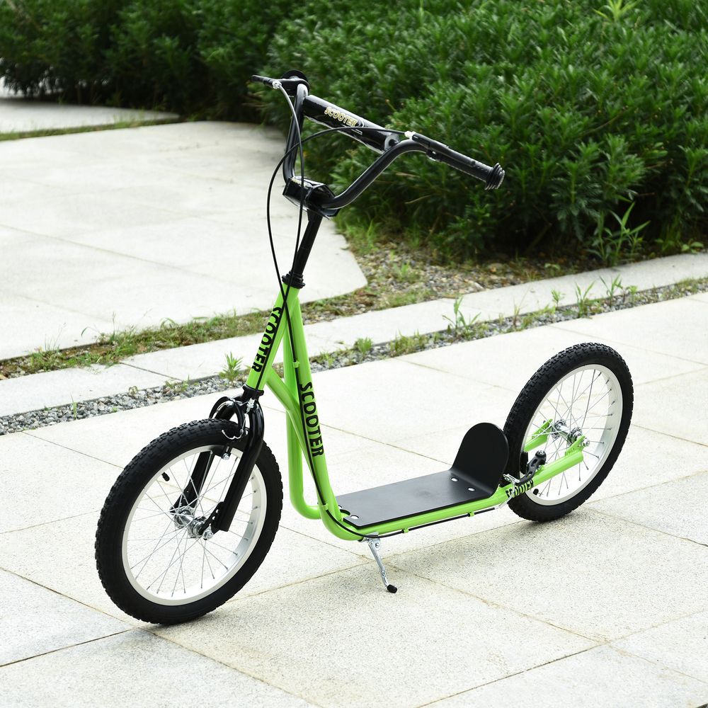 Green kids kick scooter with black handlebars and large front and rear wheels