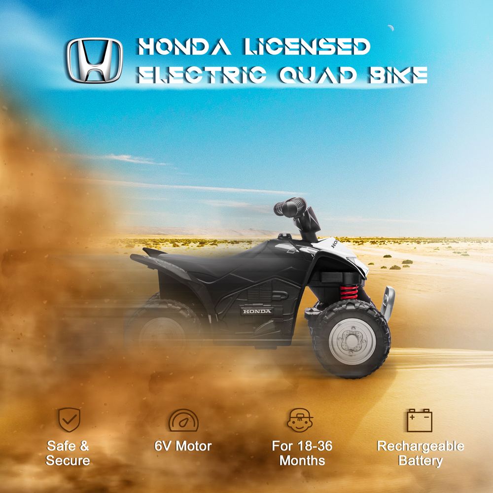 Black kids electric quad bike in side view with red spring suspension and front grille