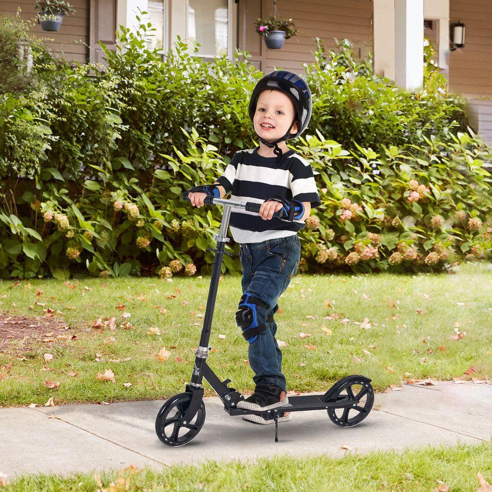 Black kids ride-on scooter with adjustable handlebar, three wheels, and kickstand