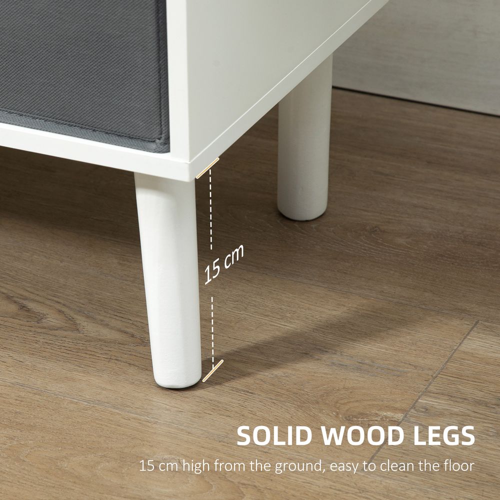 TV cabinet with white solid legs, gray drawers, and open storage shelves under TV top