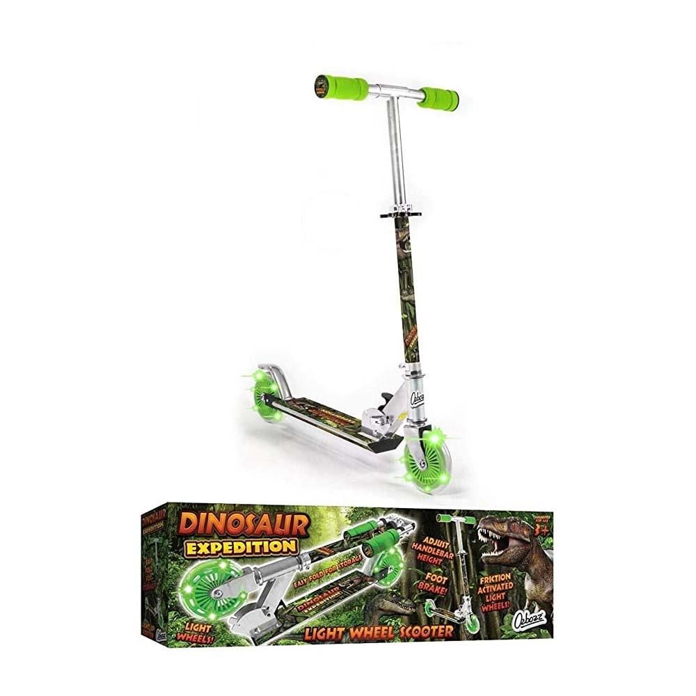 Kids dinosaur graphic 2-wheel scooter with green wheels, shown with retail box