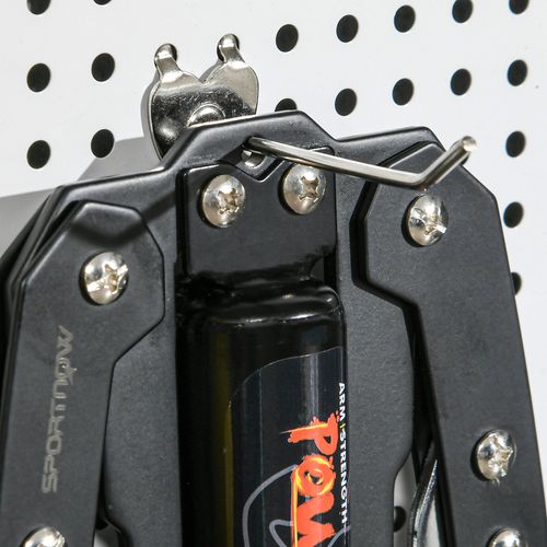 Close-up of scooter upper joint and bolts on black frame with orange-red logo