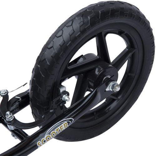 Kids kick scooter close-up of tread tire and black rear wheel rim