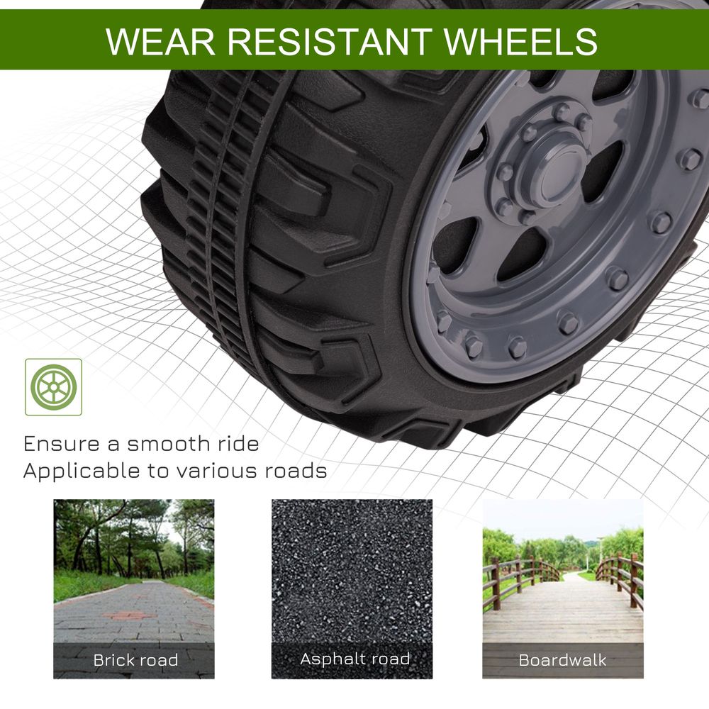 Large treaded front wheel of a lime green ride-on quad bike ATV