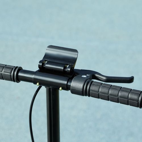 Black handlebar grips with folding clamp on kids kick scooter, front steering stem