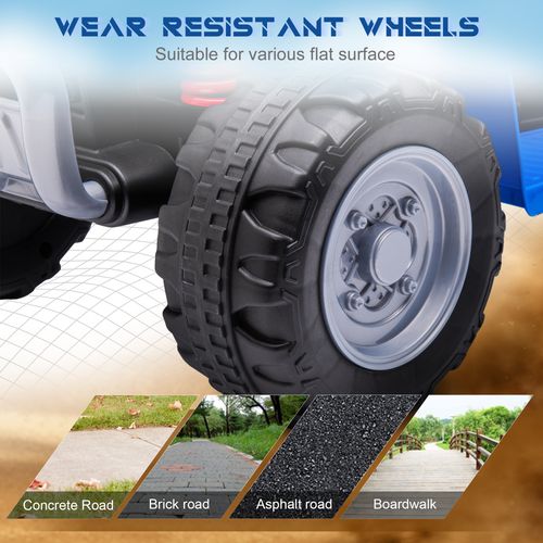 Close-up of blue kids electric quad bike tires with deep tread