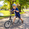 Kids kick scooter with black deck, chrome handlebar, dual brakes, rubber tires