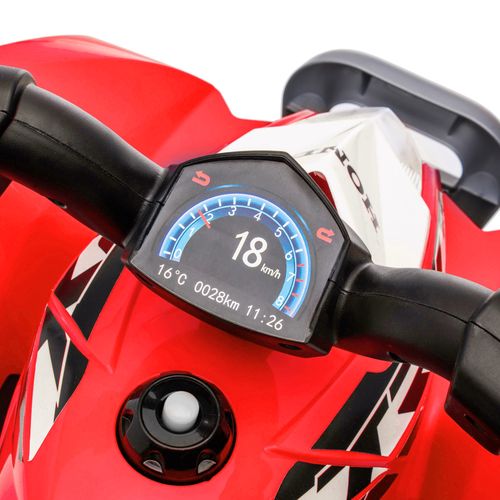 Close-up of kids electric quad bike dashboard display and handlebar controls