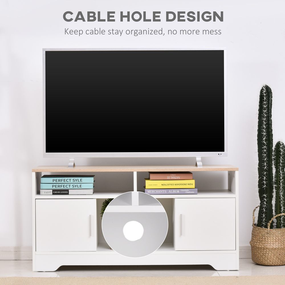 White TV stand cabinet with open shelves, drawers, and cable hole