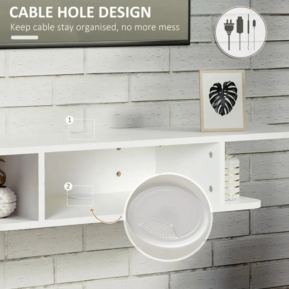 White floating TV console with a circular cable hole opening