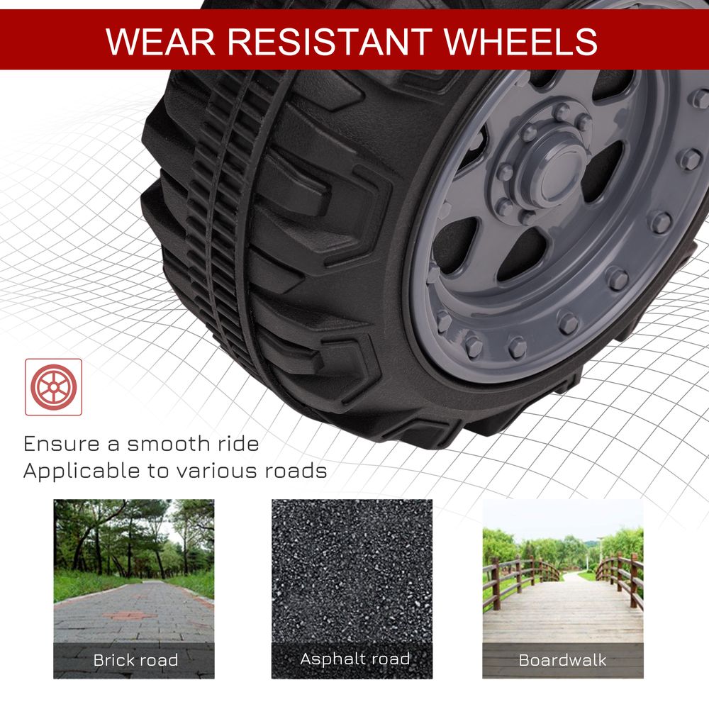 Black tread tires on a red kids quad ATV wheel hub for smooth ride.