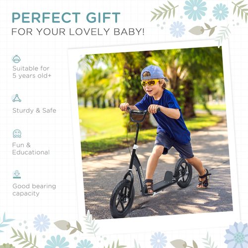 Kids kick scooter in use with black frame, footboard deck and front wheel