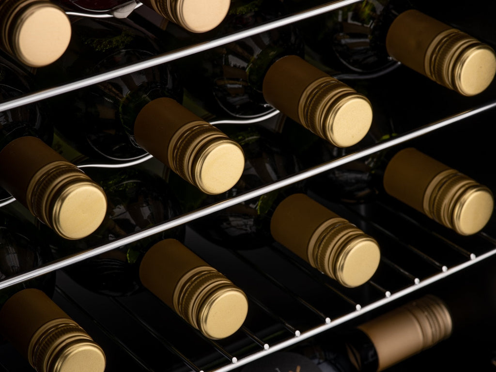 Wine cooler interior with bottles on wire shelves under LED lighting