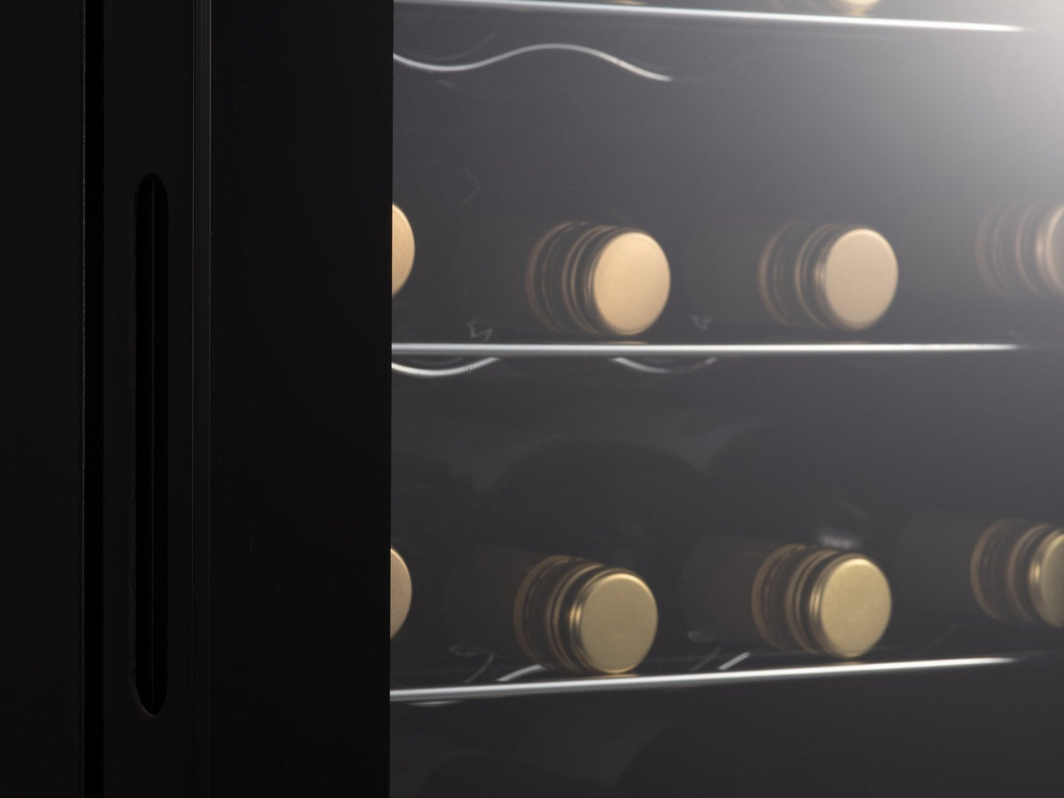 LED-lit wine cooler with glass door, showing rows of bottles on wire shelves