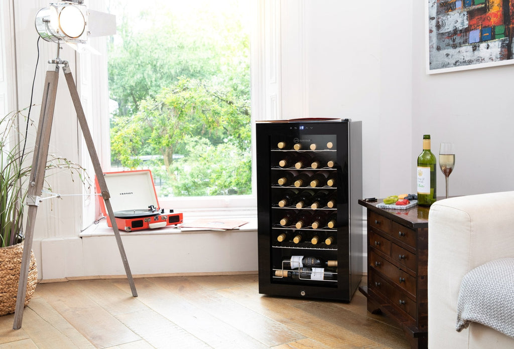 Freestanding black wine cooler with glass door, LED-lit interior, and bottle storage