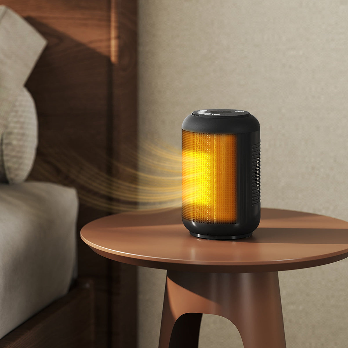 Black ceramic electric heater with glowing amber heat element on round tabletop